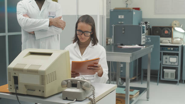 portrait of a young female doctor and a young male doctor