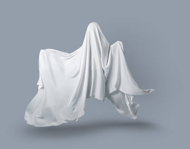 istock a Ghost in a white fabric fluttering in the wind on a gray background in the Studio. Halloween minimal concept. 1177241562