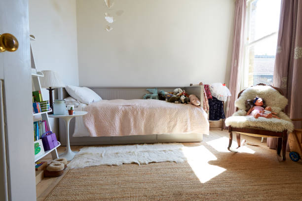 istock Empty Interior Of Young Girls Bedroom With Desk And Storage 1177241834