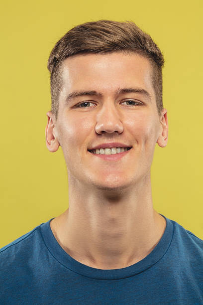 istock Caucasian young man's close up shot on yellow background 1177242354