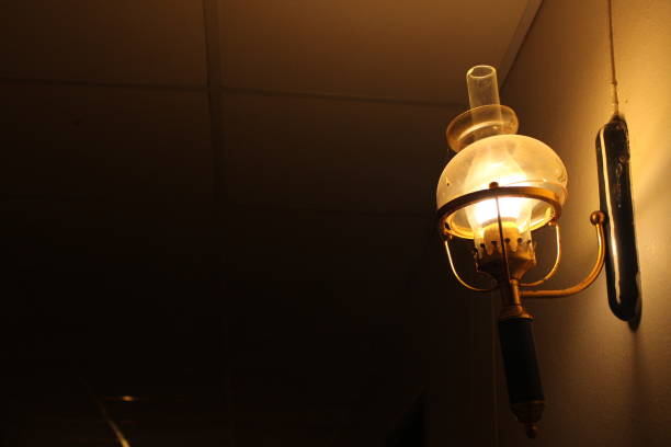istock Old light bulbs shine in the darkness - images 1177243860