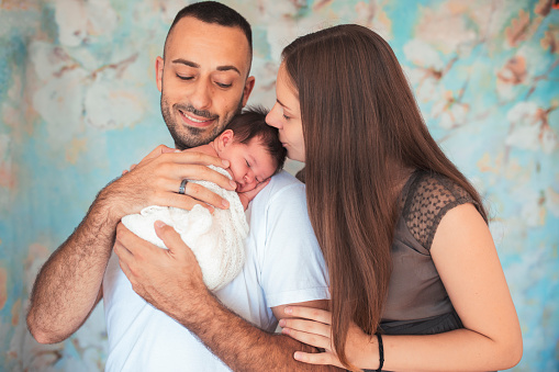 Young family and newborn baby