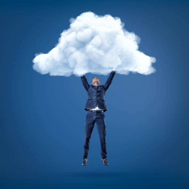 istock Businessman hanging in the air holding white cloud with both hands 1177248838