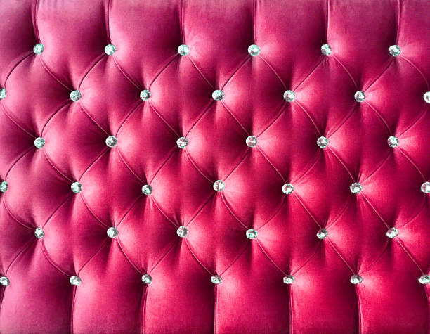 istock Elegant pink quilted textile wall with jewelry buttons 1177254274