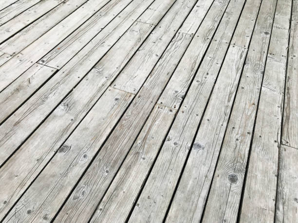 istock Grey timber flooring plank stripes texture. Perspective. Walkway design 1177254314