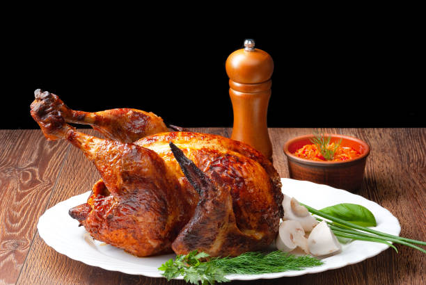 istock image of delicious roasted chicken on wood background 1177257183