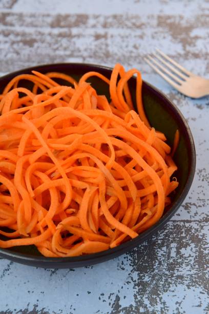 istock Fresh raw organic spiralized carrot noodle 1177262004
