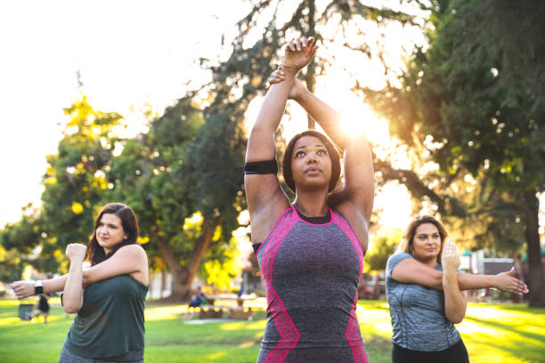Young women jogging and getting healthy at the park