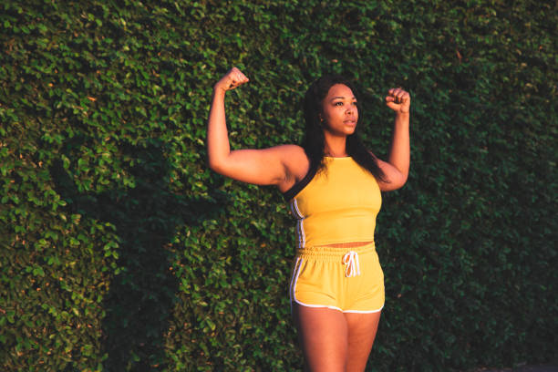 Young woman jogging and getting healthy at the park
