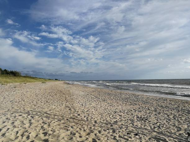 istock Wild sandy beach under cloudy sky of sunset 1177268289