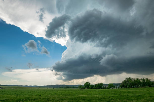 istock Classic supercell thunderstorm with rotating wallcloud and anvil over the great plains in South Dakota 1177271778