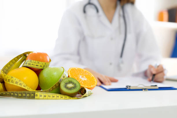 istock Doctor writes the prescription for diet 1177277864
