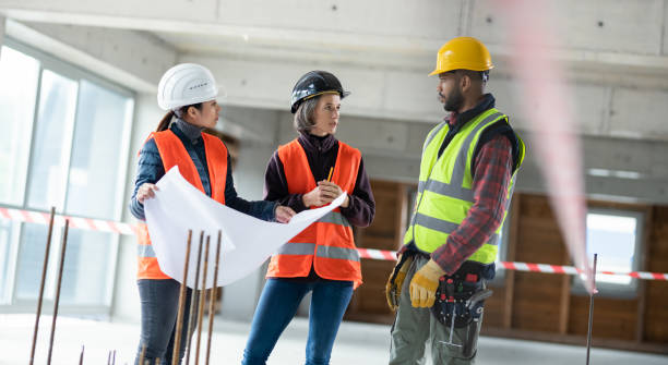 istock Construction Foreman Talking To Investors At A Construction Site 1177281158