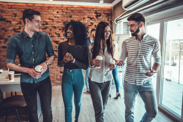 istock Group of coworkers having a coffee break 1177284045