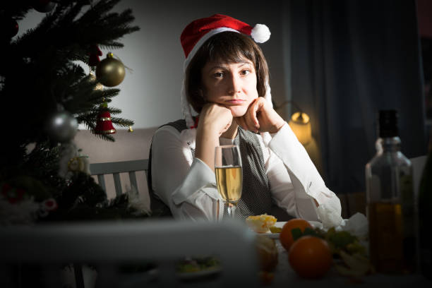 istock Sad woman celebrating New Year alone 1177284114