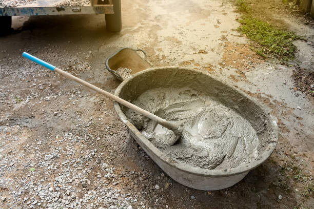 istock Bucket cement mix with on construction site the ingredients. Brick, Stone, Mortar, Sand 1177285190