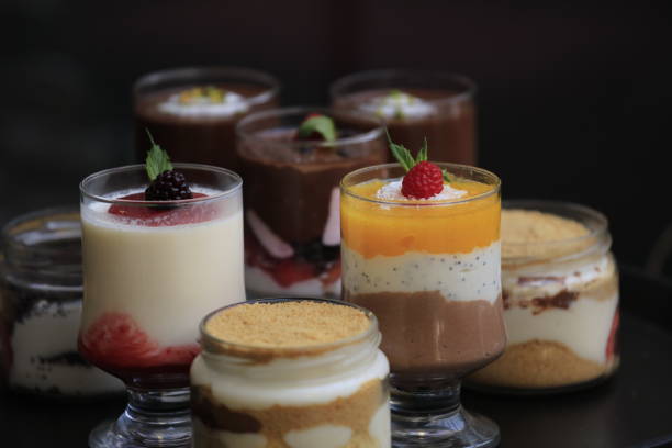 Glasses with different sorts of desserts