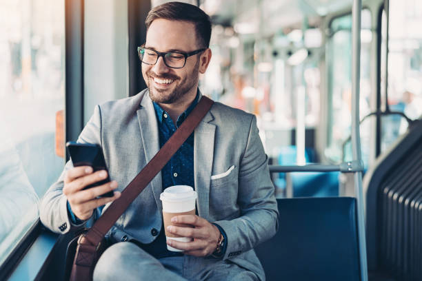istock Businessman texting in the bus 1177286075