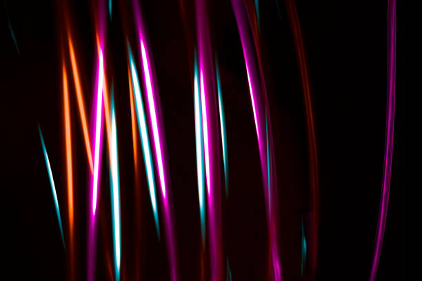 istock Multicoloured bright neon abstract for backgrounds Lights in motion on black background 1177287390