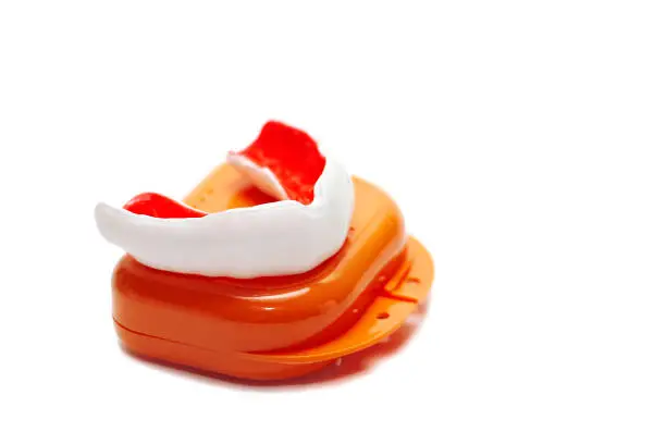 A white custom mouthguard. Professional sport equipment