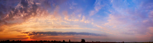istock Bright sunlight through the clouds against a breathtaking evening sky at sunset. 1177288375