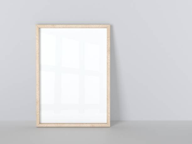 istock Wooden frame isolated on gray wall. 1177288440