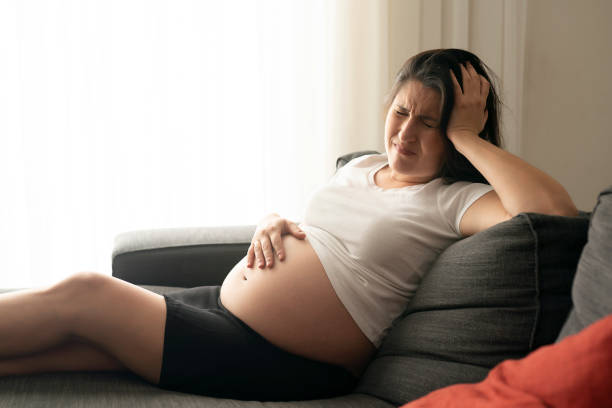 istock Pregnant is having pains 1177289987