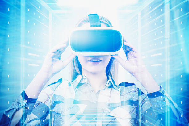 istock Woman in VR glasses in server room 1177289995
