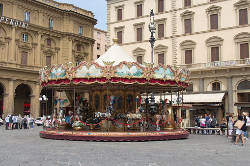 Italy, Florence - May 18 2017: the view of the carousel in the Piazza della Repubblica on May 18 2017 in Florence, Tuscany, Italy.