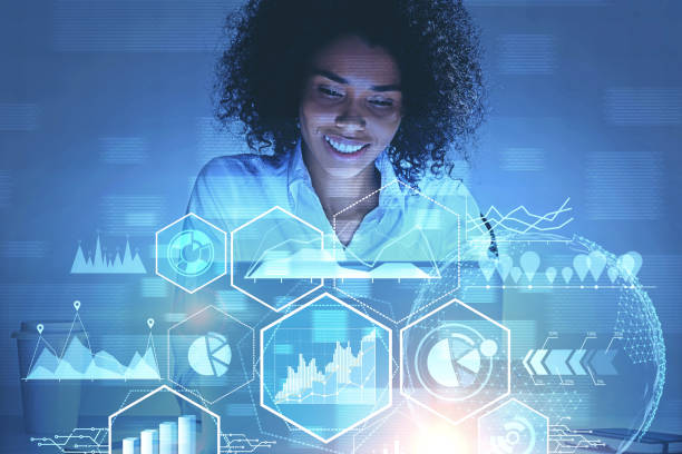 istock Smiling African woman working with infographics 1177291696