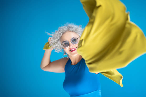 istock Beaming mature pretty woman smiling while posing 1177291800