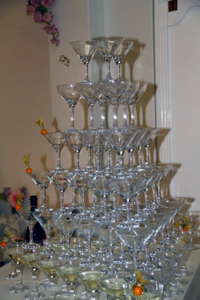 istock champagne glasses standing in a pyramid at a wedding 1177292926