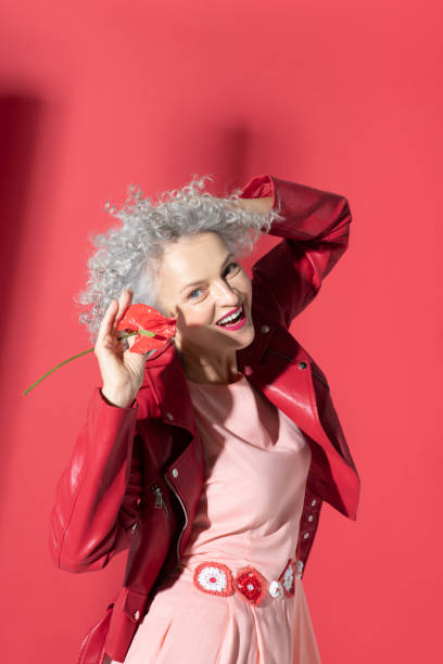 istock Woman wearing dress with stylish belt laughing while posing 1177292945