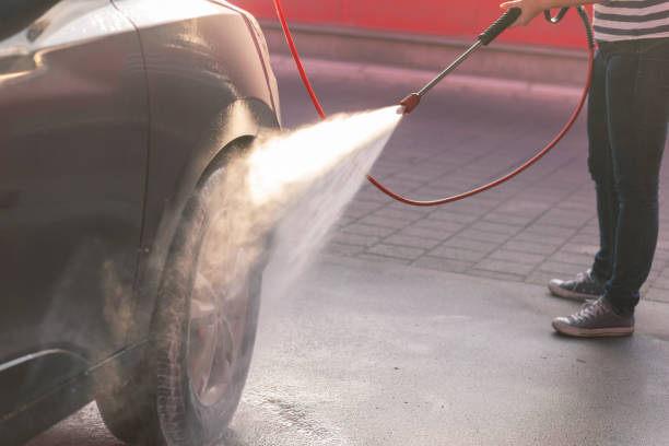 istock Woman washing a car 1177293141