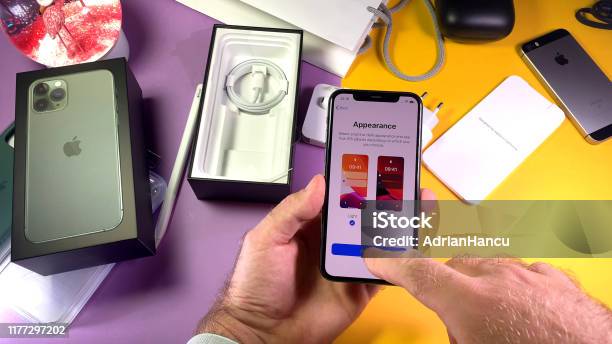 Man Unboxing Latgest Apple Computers Iphone 11 Pro Stock Photo - Download Image Now - Light-on-Dark Color Scheme, Telephone, Apple Store