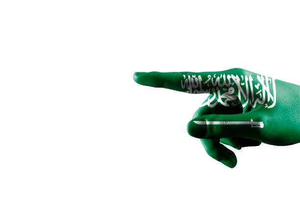 SHOWING - Hand with SAUDI ARABIA flag pointing over empty space for text / Flag concept (Click for more)