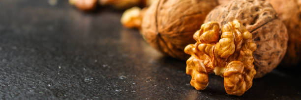 istock Walnuts, tasty and healthy (Kernels, whole nuts) menu concept. food background. copy space. Top view 1177302015