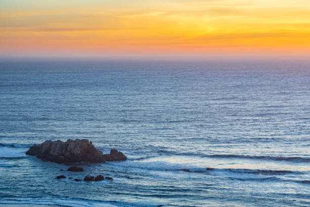 istock An idyllic scenery at Matanzas beach, the waves coming from the Pacific Ocean illuminated by a moody sky during sunset, a colorful Chilean landscape with amazing colors from the sea to the sky 1177302226