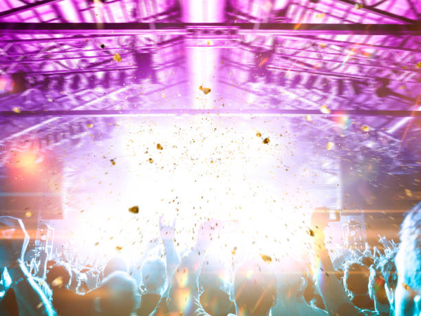 istock Concert blurred lights in a large crowded venue 1177303300