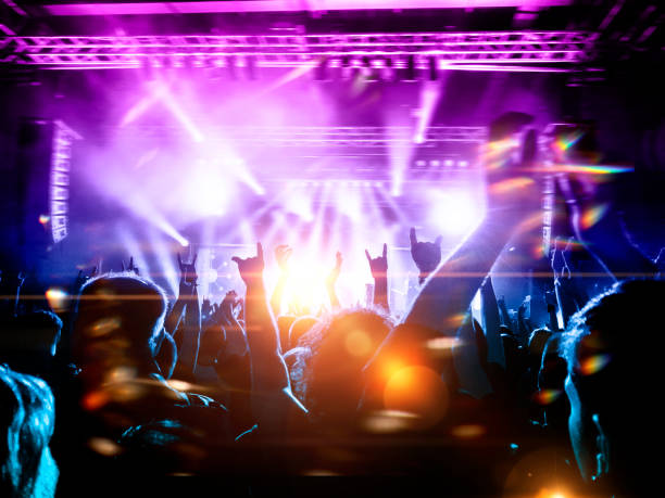 istock Concert blurred lights in a large crowded venue 1177303344