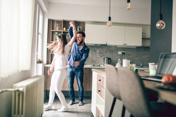 istock Couple in Love Dancing In The Kitchen 1177304899