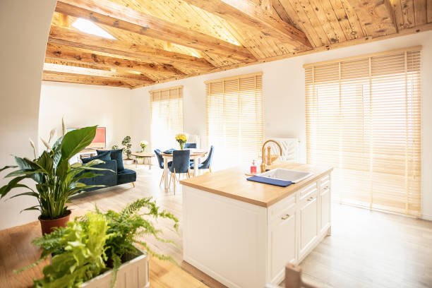 Beautiful living room with light kitchenette.