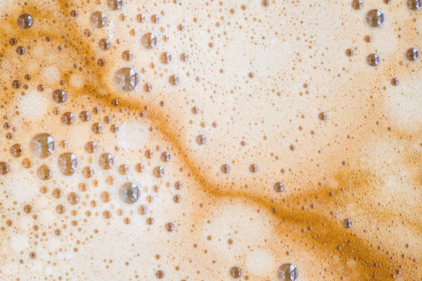 istock Black coffee with milk cream foam texture. 1177307671