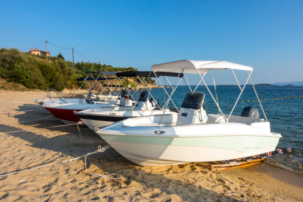 istock Boats for renting standing side by side on sand in Halkidiki, Greece 1177307736
