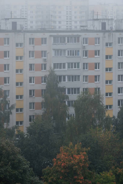 istock Morning mist over panel houses in early autumn 1177308903