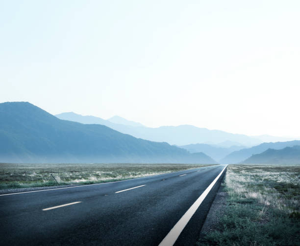 istock Open Road Leading To Mountain Pass 1177309894