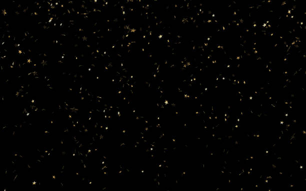 coriandoli di carta a forma di stella color oro che cadono su sfondo nero - gold confetti star shape nobody foto e immagini stock