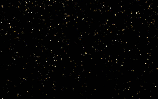 istock Gold Colored Star Shaped Paper Confetti Falling on Black Background 1177309946