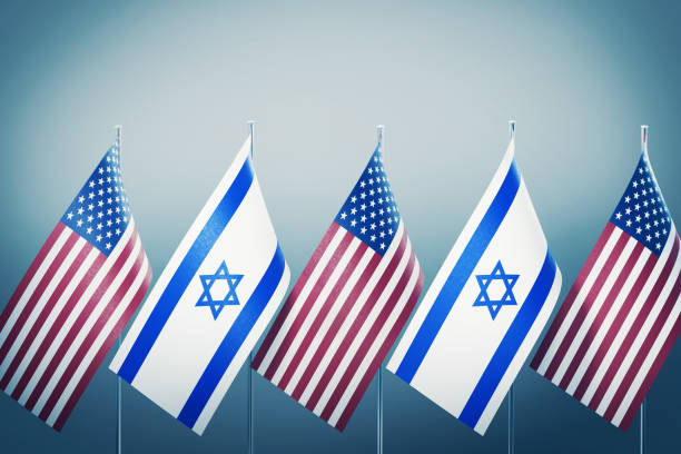 istock American and Israeli Flags in A Row on Grey Background 1177310472