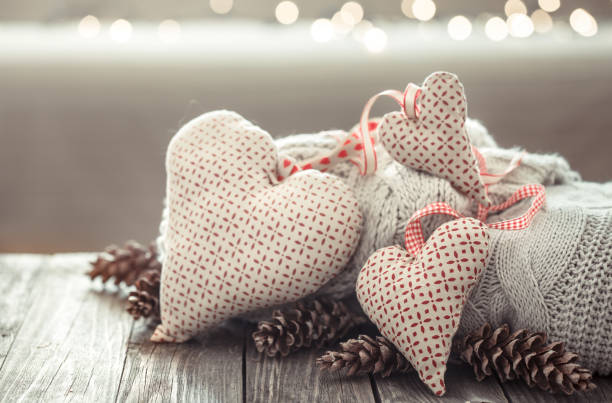 istock Cozy background on a wooden background with decorative objects hearts 1177310562
